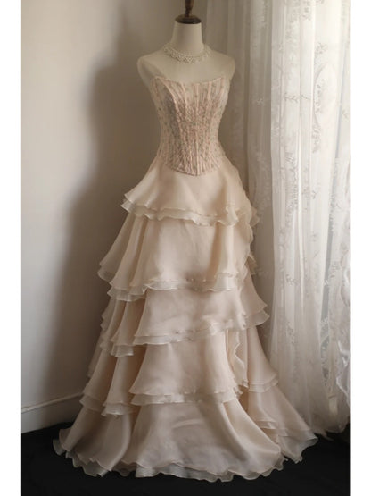 Süßes rosafarbenes trägerloses A-Linien-Abendkleid aus Chiffon mit Perlen und Stufen P4235