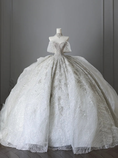 White off-the-shoulder wedding dress with sparkling diamonds and luxurious floor-length design P2509
