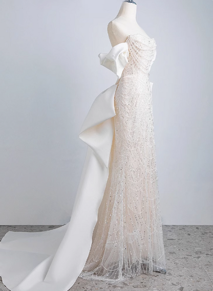 Schimmerndes Meerjungfrauen-Hochzeitskleid mit Perlen, Off-Shoulder und Schleife Prinzessin P2696